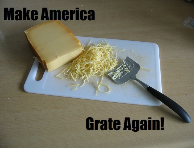Image shows a white cheese that has been grated. A grater and cutting board are present. Text says "Make America Grate Again"
