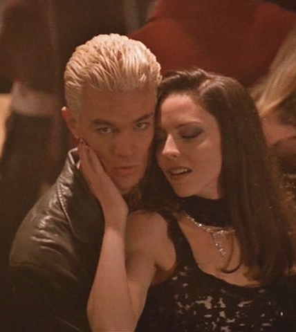 Image shows Spike and Drusilla in a sexy pose.
