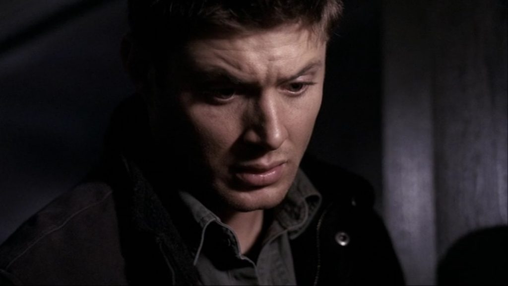 Image is a close-up of Dean's face. He's quirked an eyebrow and looks rather nauseated and horrified.