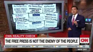 CNN news segment featuring a montage of headlines from from the editorials today, each declaring that the press is not the enemy