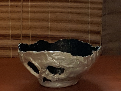 Skull yarn bowl made from air dry clay.